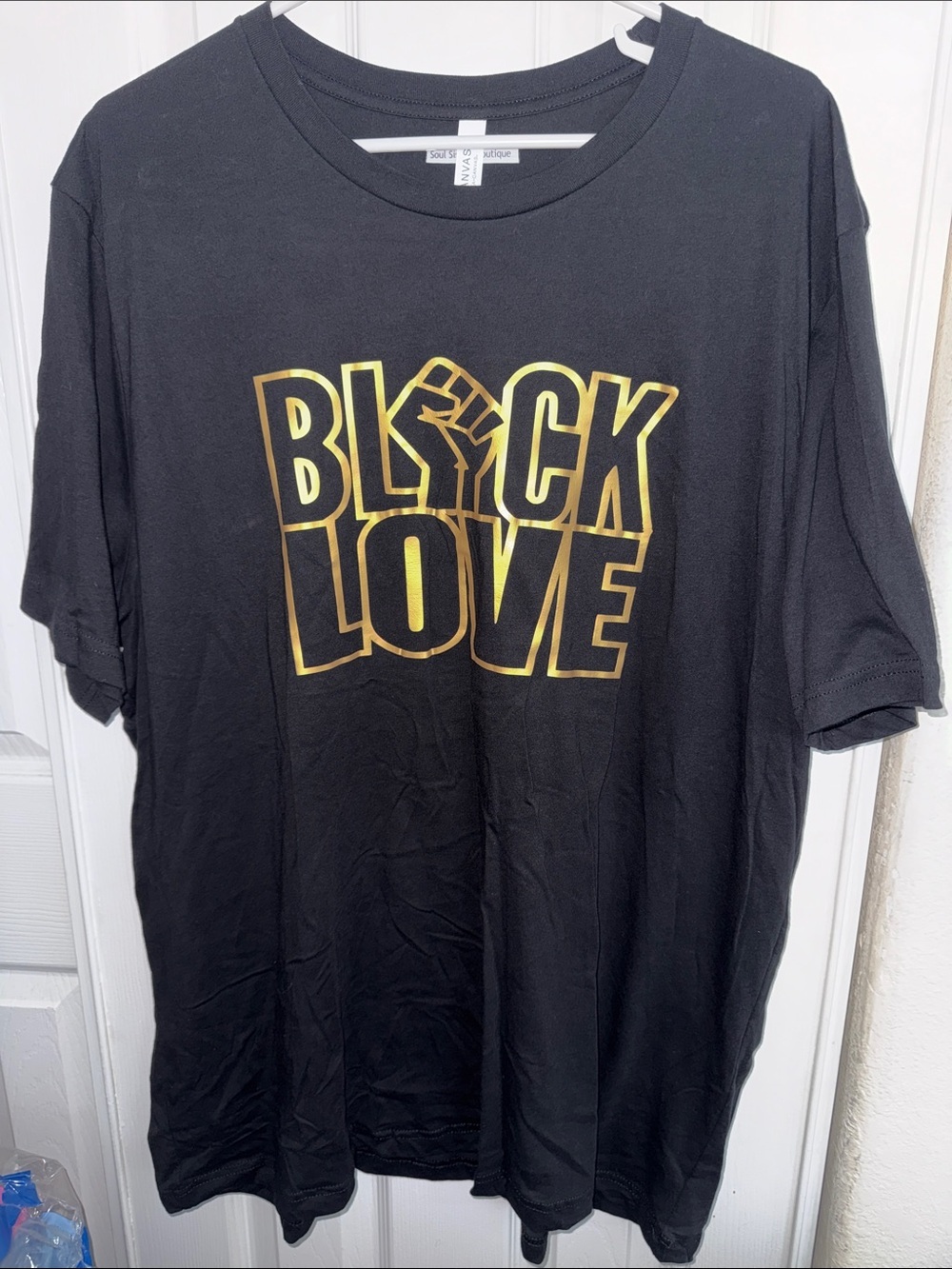 Bella Canvas Black Graphic Tee with White Tag Detail